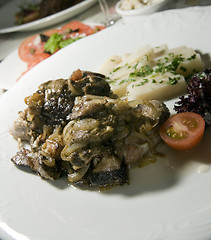 Image showing Polish style classic food pork sirloin stewed with mushrooms as 