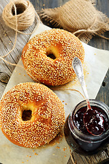 Image showing Bagels and jam in a jar.