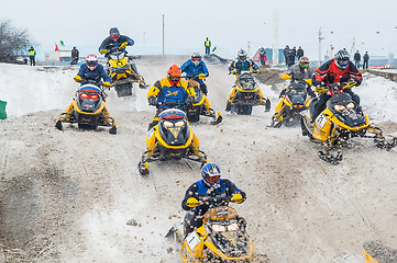 Image showing Racing of sportsmen on snowmobile