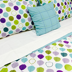 Image showing Bright dotted bed clothing