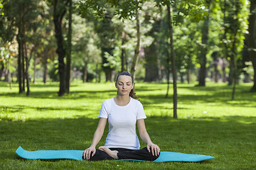 Image showing Girl Relaxing in a Green Park