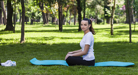 Image showing Girl Relaxing in a Green Park