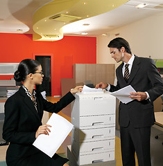 Image showing businesswoman making copies l