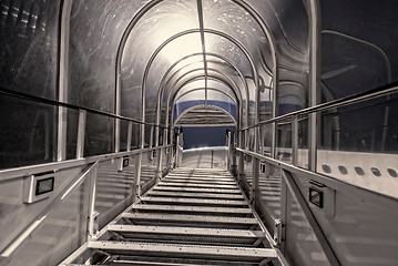 Image showing White gangway interior for an airplane