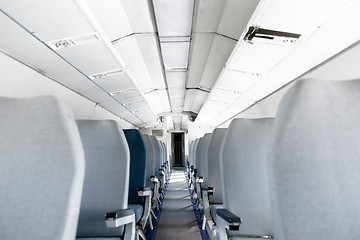 Image showing Interior of an airplane with many seats