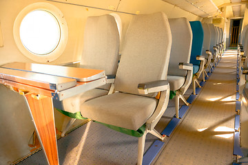 Image showing Interior of an airplane with many seats