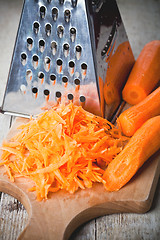 Image showing metal grater and carrot