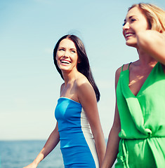 Image showing girls walking on the beach