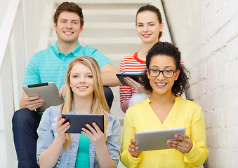 Image showing smiling students with tablet pc computer