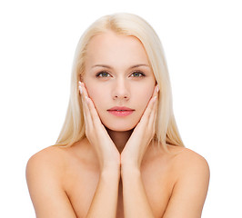 Image showing face of beautiful woman touching her face skin