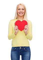 Image showing smiling woman with red heart