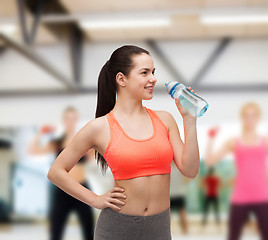 Image showing sporty woman with water bottle