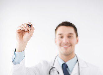 Image showing doctor writing something in the air