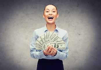 Image showing young businesswoman with dollar cash money