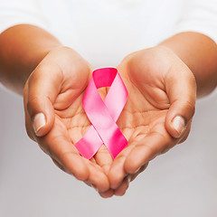 Image showing hands holding pink breast cancer awareness ribbon