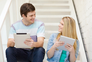 Image showing smiling students with tablet pc computer