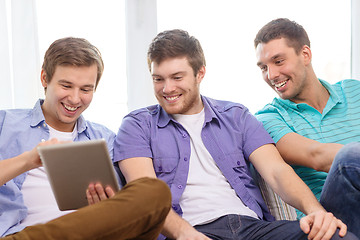 Image showing smiling friends with tablet pc computers at home