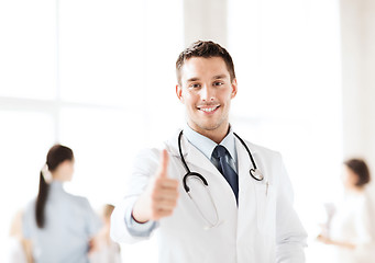 Image showing doctor with stethoscope showing thumbs up