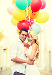 Image showing couple with colorful balloons