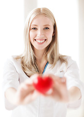 Image showing female doctor with heart