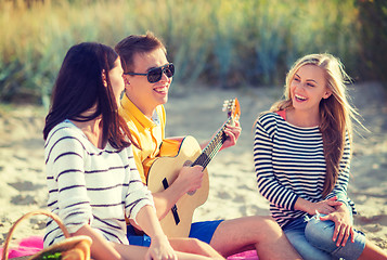 Image showing group of friends having fun on the beach