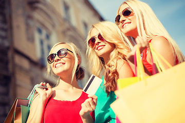 Image showing beautiful women with shopping bags in the ctiy