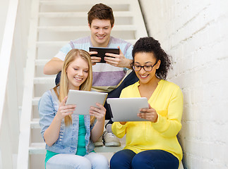 Image showing smiling students with tablet pc computer