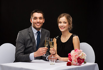 Image showing couple with glasses of champagne at restaurant
