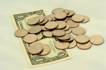 Image showing quarters and a dollar note