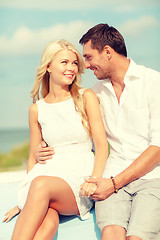 Image showing smiling couple at sea side