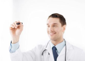 Image showing doctor writing something in the air