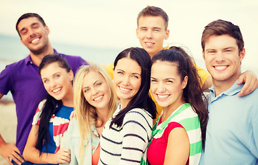 Image showing group of friends having fun on the beach