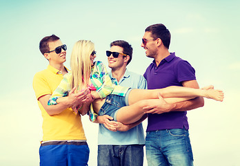 Image showing group of friends having fun on the beach