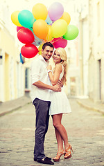 Image showing couple with colorful balloons