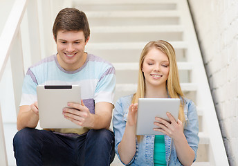 Image showing smiling students with tablet pc computer