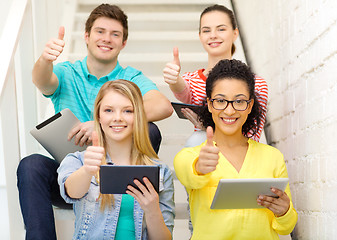 Image showing smiling students with tablet pc computer