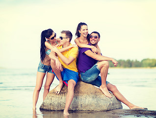 Image showing group of friends having fun on the beach