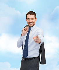 Image showing handsome buisnessman with jacket over shoulder