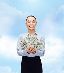 Image showing young businesswoman with dollar cash money