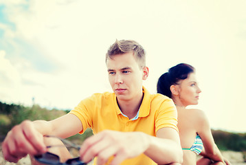 Image showing stressed couple outside