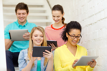 Image showing smiling students with tablet pc computer