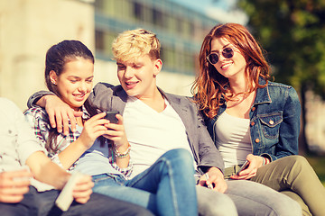 Image showing group of students or teenagers with smartphones