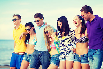 Image showing group of friends having fun on the beach