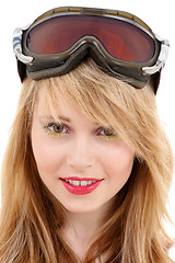 Image showing smiling teenage girl in snowboard goggles