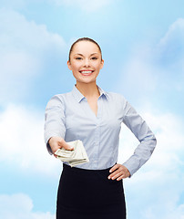 Image showing young businesswoman with dollar cash money