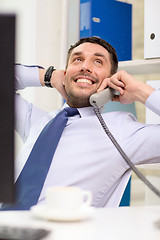 Image showing smiling businessman or student with computer