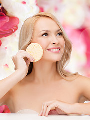 Image showing beautiful woman with sponge