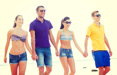 Image showing group of friends having fun on the beach