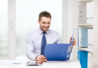 Image showing businessman with folder and tablet pc computer
