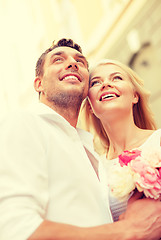 Image showing couple with flowers in the city